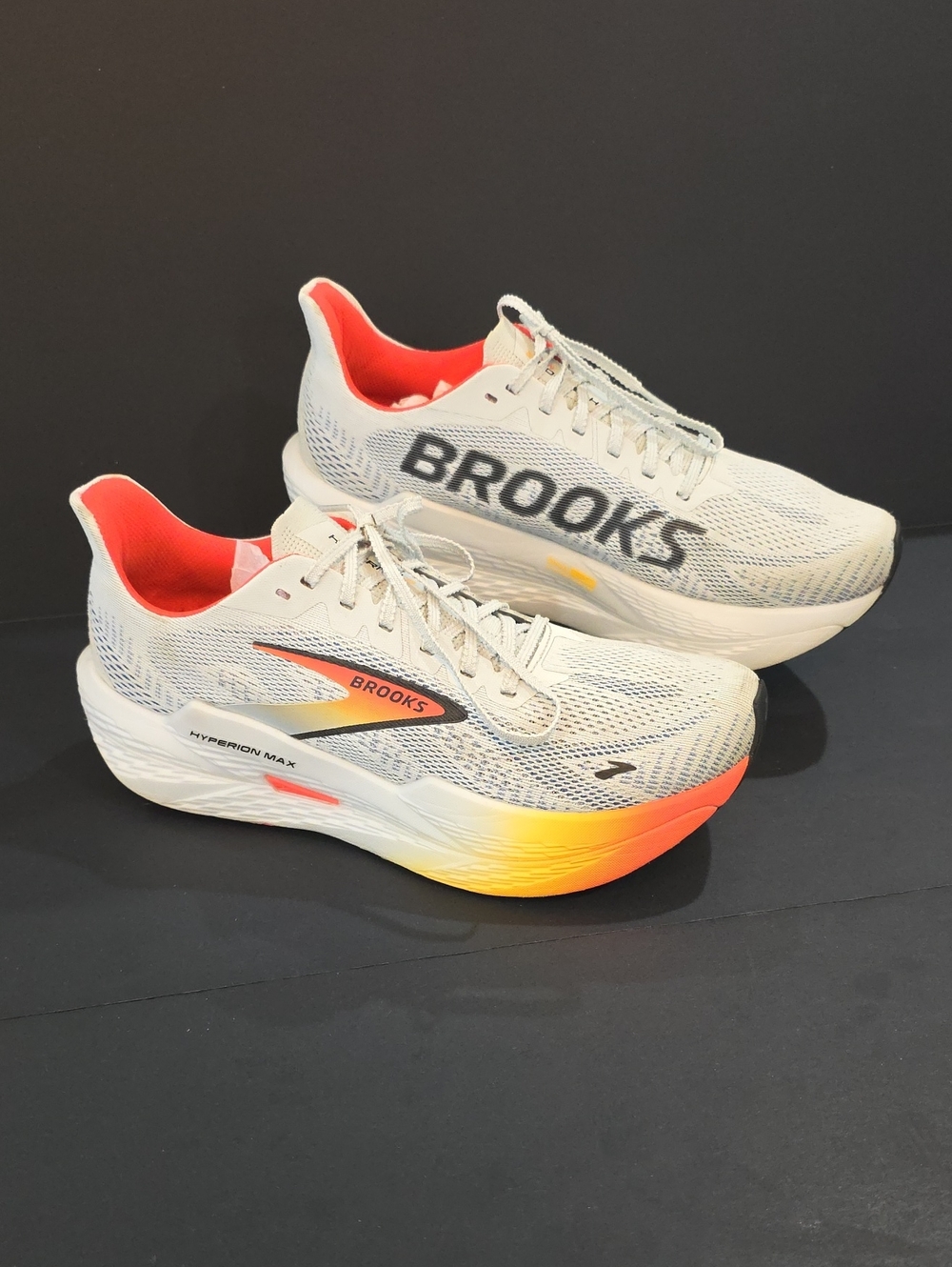 Brooks White Running Shoes with Orange and Yellow Gradient